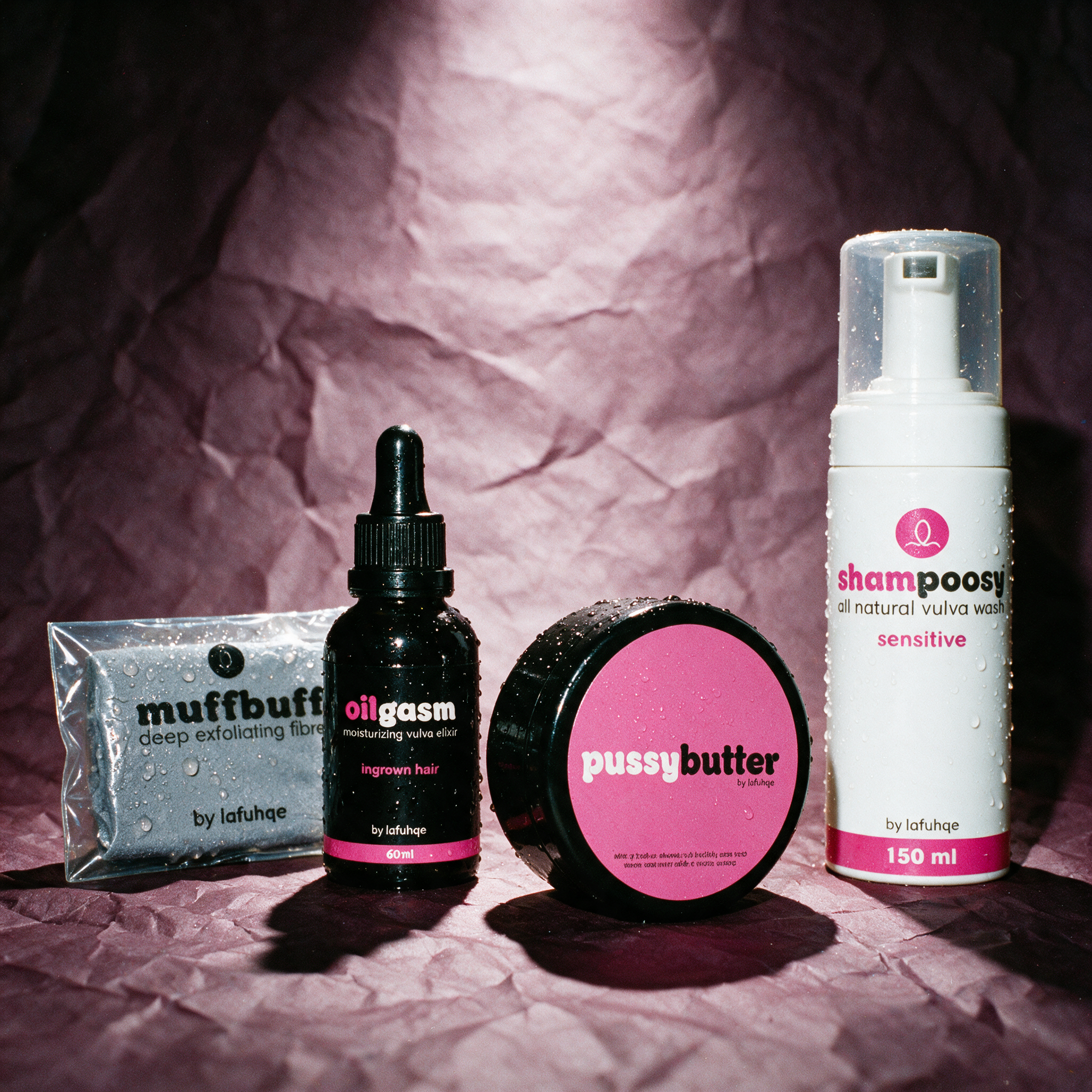 Soft and Supple vulva moisture bundle on deep aubergine plum backdrop