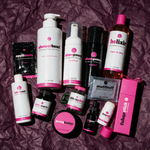 The Full Line everything bundle flat lay on deep plum backdrop