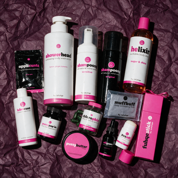 The Full Line everything bundle flat lay on deep plum backdrop