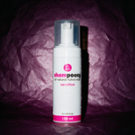 Shampoosy Sensitive vulva wash, white foamer bottle on deep plum crumpled paper