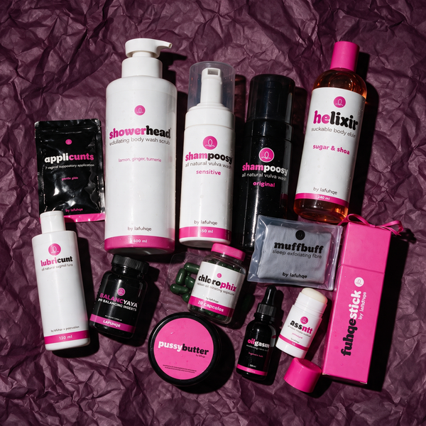 The Full Line everything bundle flat lay on deep plum backdrop